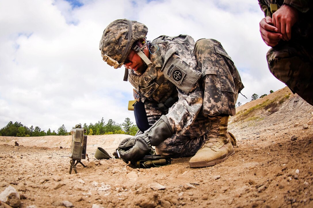 Army Pfc. Tounn prepares to place a blasting cap into an M18A1  claymore mine during a training exercise at Fort Bragg, N.C., Sept. 16, 2016. Tounn is an aviation support maintainer assigned to the 82nd Airborne Division’s 122nd Aviation Support Battalion, 82nd Combat Aviation Brigade. Army photo by Capt. Adan Cazarez