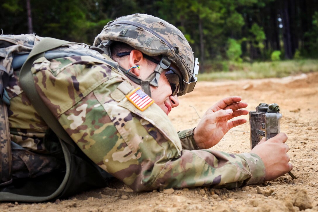 Army Pfc. Lamb positions an M18A1 antipersonnel claymore mine during a training exercise at Fort Bragg, N.C., Sept. 16, 2016. Lamb is assigned to the 82nd Airborne Division’s 122nd Aviation Support Battalion, 82nd Combat Aviation Brigade. Army photo by Capt. Adan Cazarez