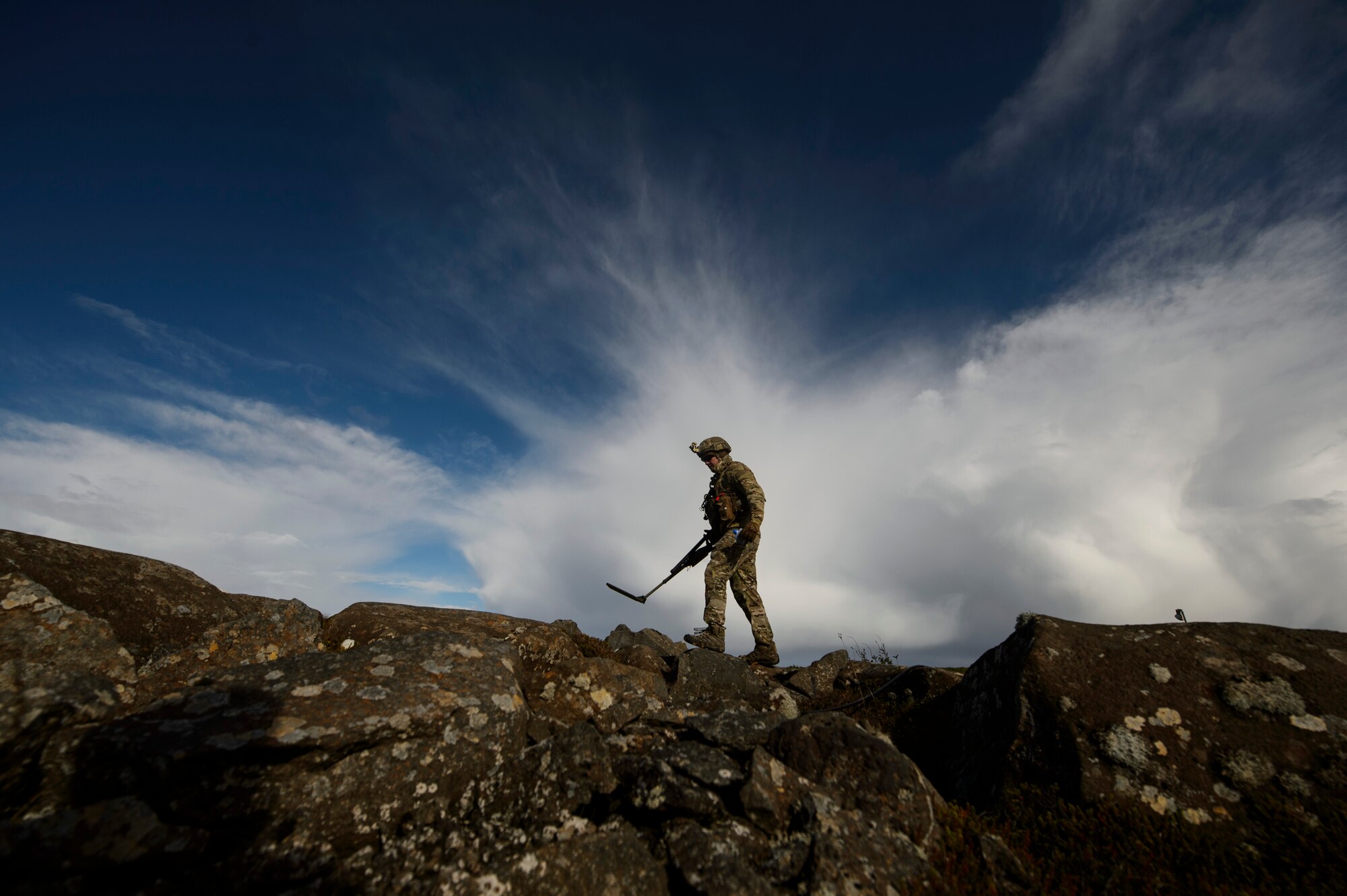 U.S. Air Force Staff Sgt. Cole Carroll, 52nd Civil Engineer Squadron explosive ordnance disposal craftsman, Spangdahlem Air Base, Germany, sweeps an area with a mine detector during Northern Challenge 16 exercise at Icelandic Coast Guard Keflavik Facility, Iceland, Sept. 19, 2016. The exercise focused on disabling improvised explosive devices in support of counter-terrorism tactics to prepare Partnership for Peace, NATO, and Nordic nations for international deployments and defense against terrorism. (U.S. Air Force photo by Staff Sgt. Jonathan Snyder)             