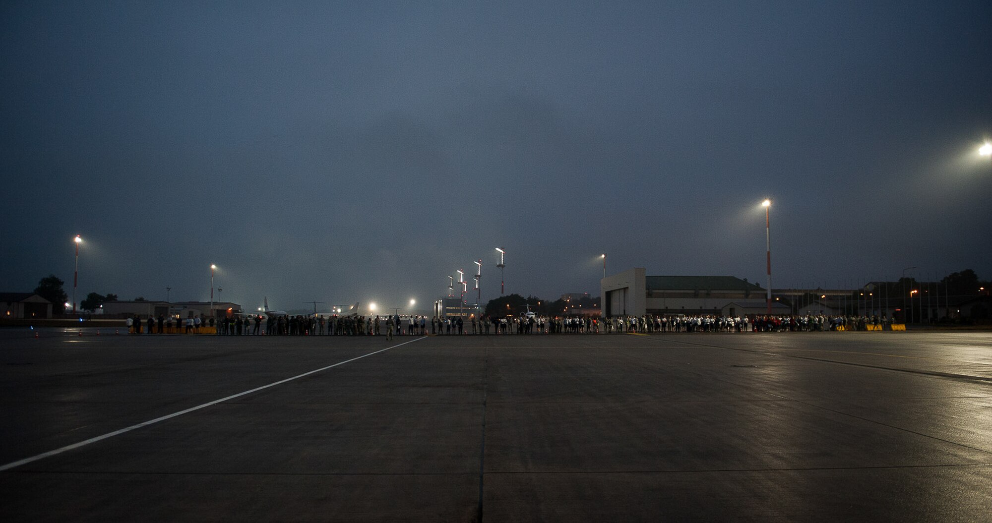 Ramstein Airmen attend a foreign object damage prevention walk Sept. 20, 2016, at Ramstein Air Base, Germany. This FOD walk was critical to the reactivation of Taxiway Delta, Ramp 2, and both Hangars 1 and 2, which were closed due to the Ramstein Bazaar. (U.S. Air Force photo/ Airman 1st Class Savannah L. Waters)