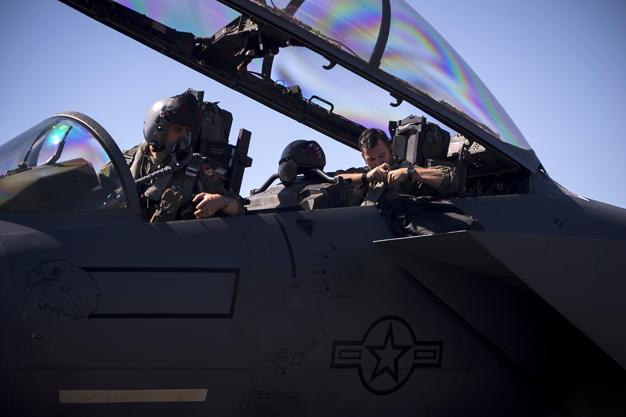 Capt. Clark Haymond, 494th Fighter Squadron pilot, and Capt. Dale Gogan, 494th FS weapon system officer, prepare themselves for a sortie in support of Tactical Leadership Programme 16-3 at Los Llanos Air Base, Spain Sep. 19. The training prepares NATO and allied forces’ flight leaders to be mission commanders, lead coalition force air strike packages, instruct allied flying and non-flying personnel in matters related to tactical composite air operations, and provide tactical air expertise to NATO agencies. (U.S. Air Force photo/ Staff Sgt. Emerson Nuñez)