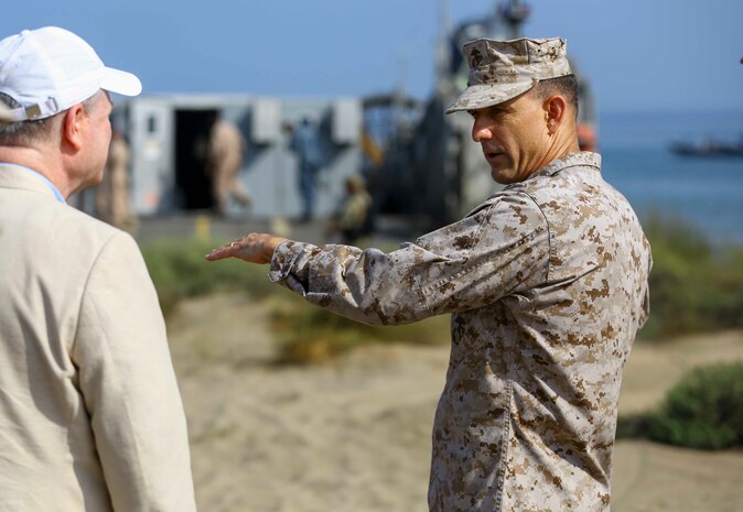 U.S. Marine Brig. Gen. Francis L. Donovan, Commanding General of Task Force 51 Naval Amphibious Force, and 5th Marine Expeditionary Brigade, speaks with U.S. Ambassador Marc J. Sievers during a bilateral non-combatant evacuation exercise at the U.S. Embassy, Muscat, Oman, Sept. 21, 2016. The non-combatant evacuation exercise is an opportunity for the United States and Oman to practice a bilateral mission of quickly providing security and safety to U.S. and international citizens abroad during a natural disaster or contingency.