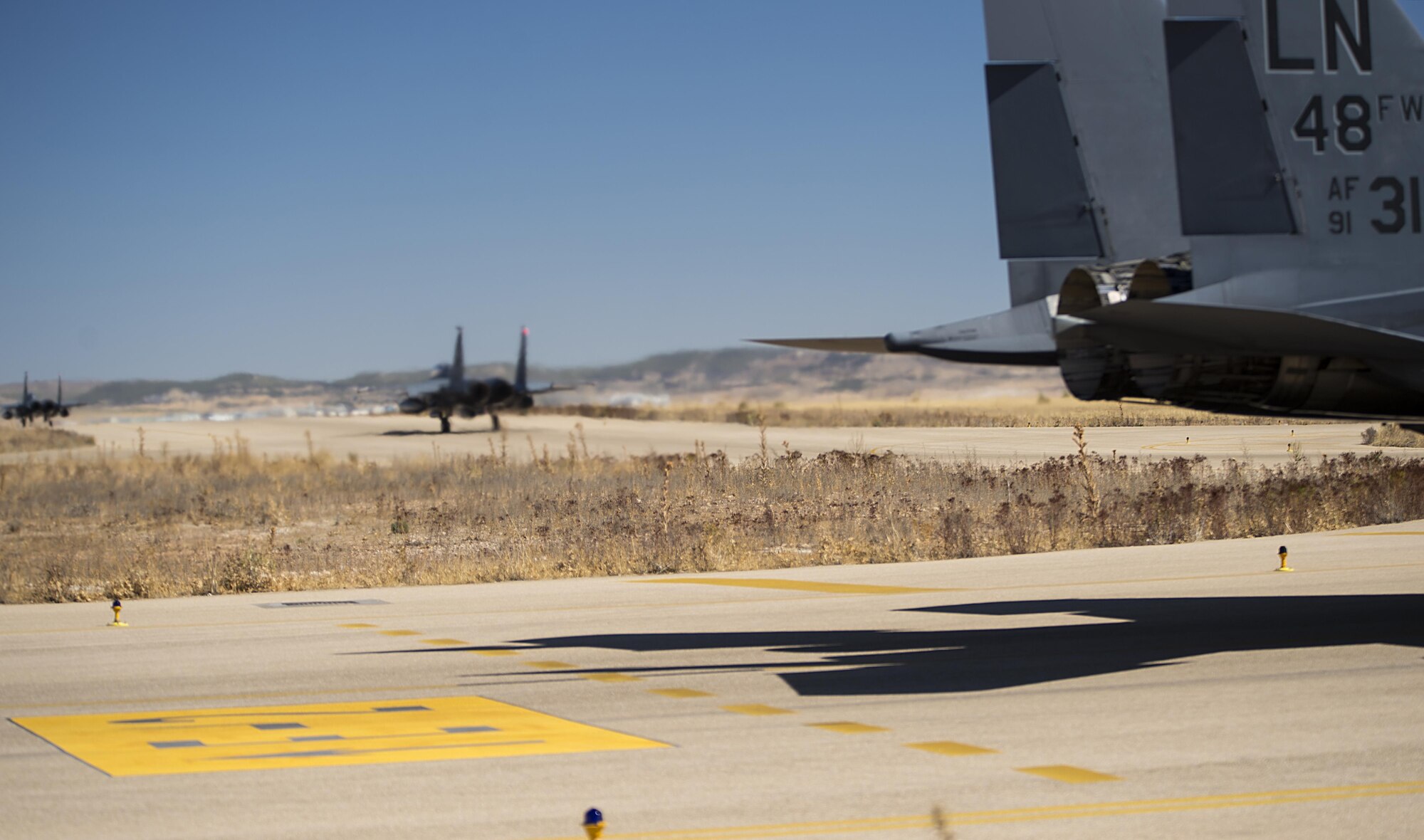 F-15E Strike Eagles assigned to the 494th Fighter Squadron from Royal Air Force Lakenheath, England, taxi for take-off in support of Tactical Leadership Programme 16-3 at Los Llanos Air Base, Spain Sep. 19. Throughout its 39 year history, TLP has become the focal point for NATO’s Allied Air Forces tactical training, developing knowledge and leadership skills, necessary to face today's air tactical challenges. (U.S. Air Force photo/ Staff Sgt. Emerson Nuñez)