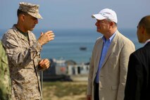 U.S. Marine Brig. Gen. Francis L. Donovan, Commanding General of Task Force 51 Naval Amphibious Force, and 5th Marine Expeditionary Brigade, speaks with U.S. Ambassador Marc J. Sievers during a bilateral non-combatant evacuation exercise at the U.S. Embassy, Muscat, Oman, Sept. 21, 2016. The non-combatant evacuation exercise is an opportunity for the United States and Oman to practice a bilateral mission of quickly providing security and safety to U.S. and international citizens abroad during a natural disaster or contingency.
