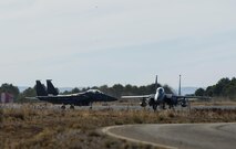 F-15 E Strike Eagles assigned to the 494th Fighter Squadron from Royal Air Force Lakenheath, England, taxi after a sortie in support of Tactical Leadership Programme 16-3 at Los Llanos Air Base, Spain Sep. 19.Throughout its 39 year history, TLP has become the focal point for NATO’s Allied Air Forces tactical training, developing knowledge and leadership skills, necessary to face today's air tactical challenges. (U.S. Air Force photo/ Staff Sgt. Emerson Nuñez)