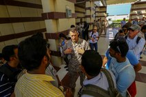 U.S. Marine Brig. Gen. Francis L. Donovan, Commanding General of Task Force 51 Naval Amphibious Force, and 5th Marine Expeditionary Brigade, speaks with U.S. and international citizens participating in a bilateral non-combatant evacuation exercise at the U.S. Embassy, Muscat, Oman, Sept. 21, 2016. The non-combatant evacuation exercise is an opportunity for the United States and Oman to practice a bilateral mission of quickly providing security and safety to U.S. and international citizens abroad during a natural disaster or contingency.