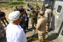 Officials with the Royal Omani Police tour a U.S. Navy Landing Craft Air Cushioned during a bilateral non-combatant evacuation exercise at the U.S. Embassy, Muscat, Oman, Sept. 21, 2016. The non-combatant evacuation exercise is an opportunity for the United States and Oman to practice a bilateral mission of quickly providing security and safety to U.S. and international citizens abroad during a natural disaster or contingency. 