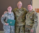 Lt. Col. Debra A. Cisney, 63rd Brigade Support Battalion outgoing commander, Col. Joseph Riciardi, 303rd Maneuver Enhancement Brigade commander, and Lt. Col. Peter F. Gleason, a Tracy, California resident and 63rd BSB incoming commander, were in attendance, during a change command ceremony at the George W. Dunaway Army Reserve Center in Sloan, Nev. September 10.