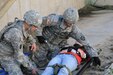 Members of the U.S. Army Reserve from the 7246 Medical Support Unit in Elkhorn, Neb., participate in an exercise, Sept. 10, at the Mead Training Site. The reserve unit was a participant of the 2016 Squad Medic Challenge, hosted by the Nebraska Army National Guard. (Nebraska National Guard photo by Sgt. Jason Drager)