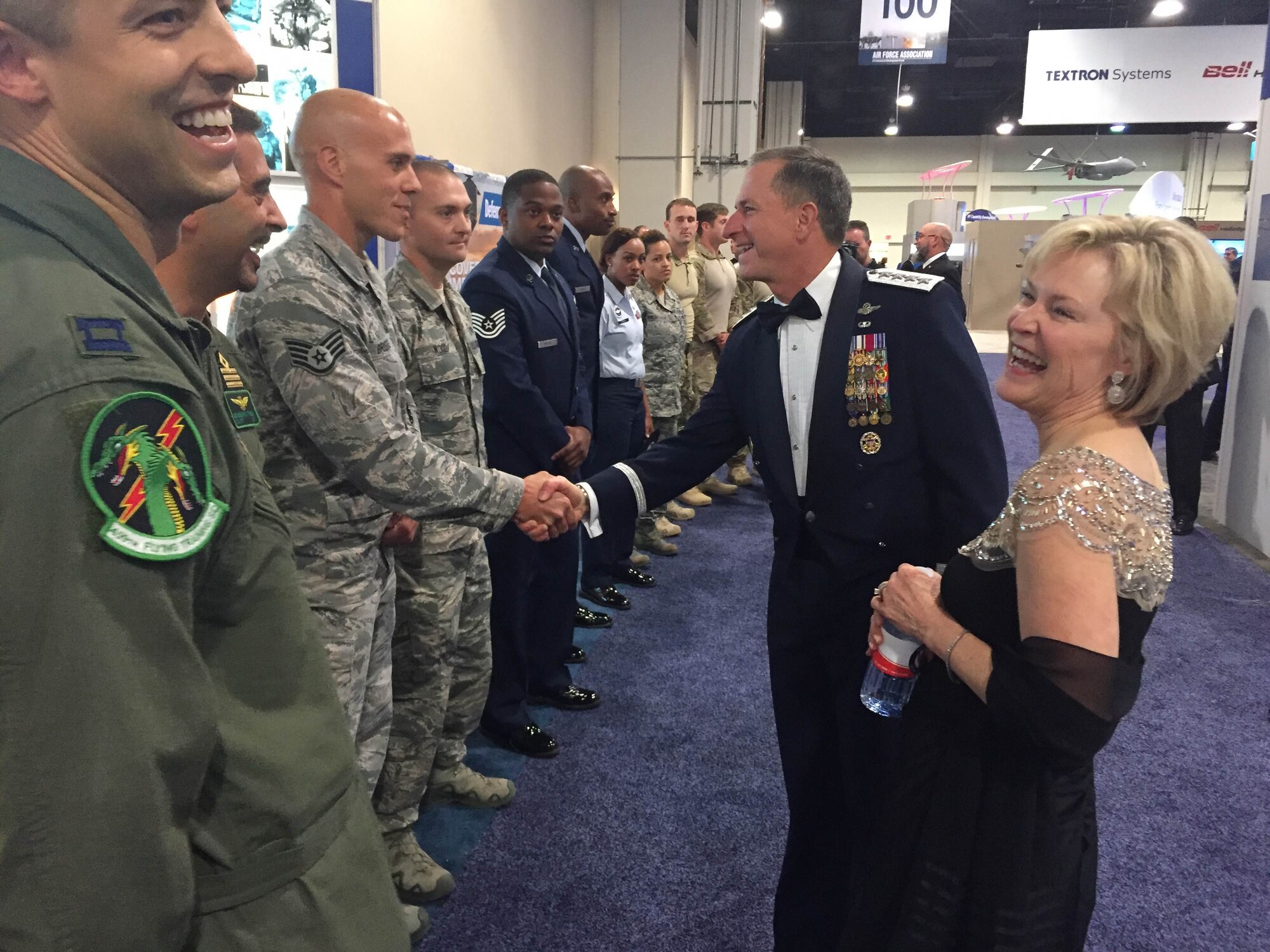 Air Force Chief of Staff Gen. Dave Goldfein and his wife thank Air Education and Training Command Airmen for their contribution to the 2016 Air, Space and Cyber Conference in National Harbor, Md., Sept. 21, 2016. Goldfein gave his first "Air Force Update," during the conference. At the AETC booth, conference attendees had the opportunity to mingle with a military training instructor, battlefield Airmen, Air Force recruiters, explosive ordnance disposal Airmen, international pilots, a special experience identifier instructor and members of the F-35 Heritage Flight Team. (U.S. Air Force photo by Senior Airman Chip Pons) 