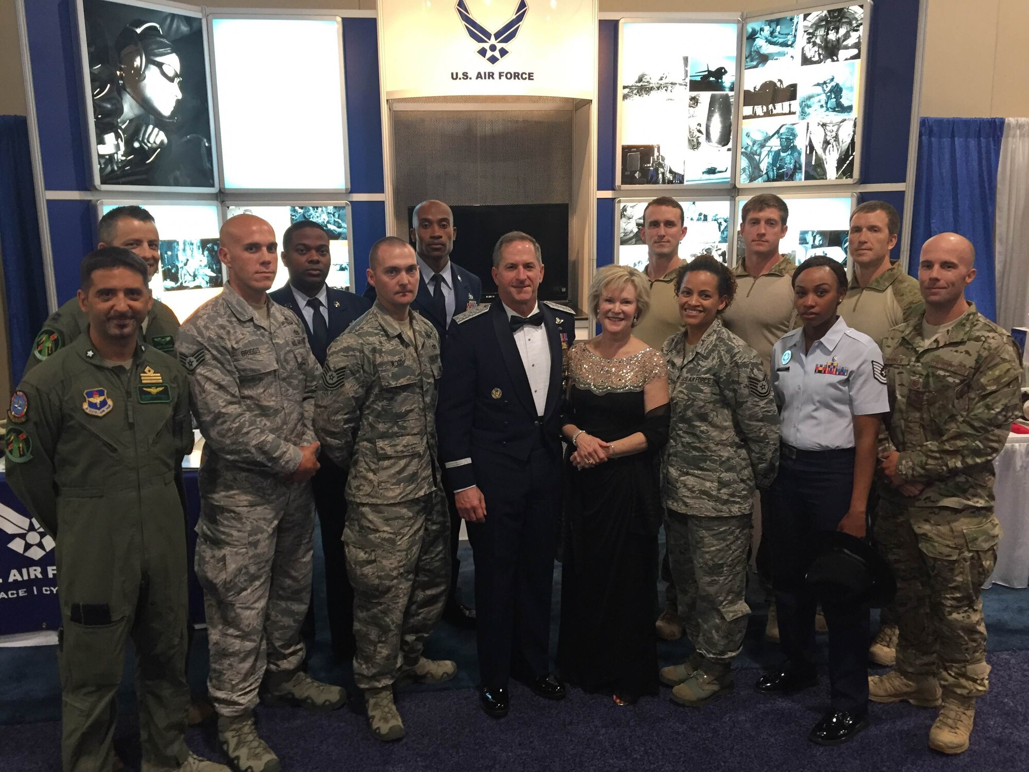 Air Force Chief of Staff Gen. Dave Goldfein and his wife, pose for a photo with Air Education and Training Command Airmen at the 2016 Air, Space and Cyber Conference, National Harbor, Md., Sept. 21, 2016. First Command Airmen from various career fields representing AETC showcased their capabilities, professionalism and innovation for conference attendees. (U.S. Air Force photo by Senior Airman Chip Pons)  