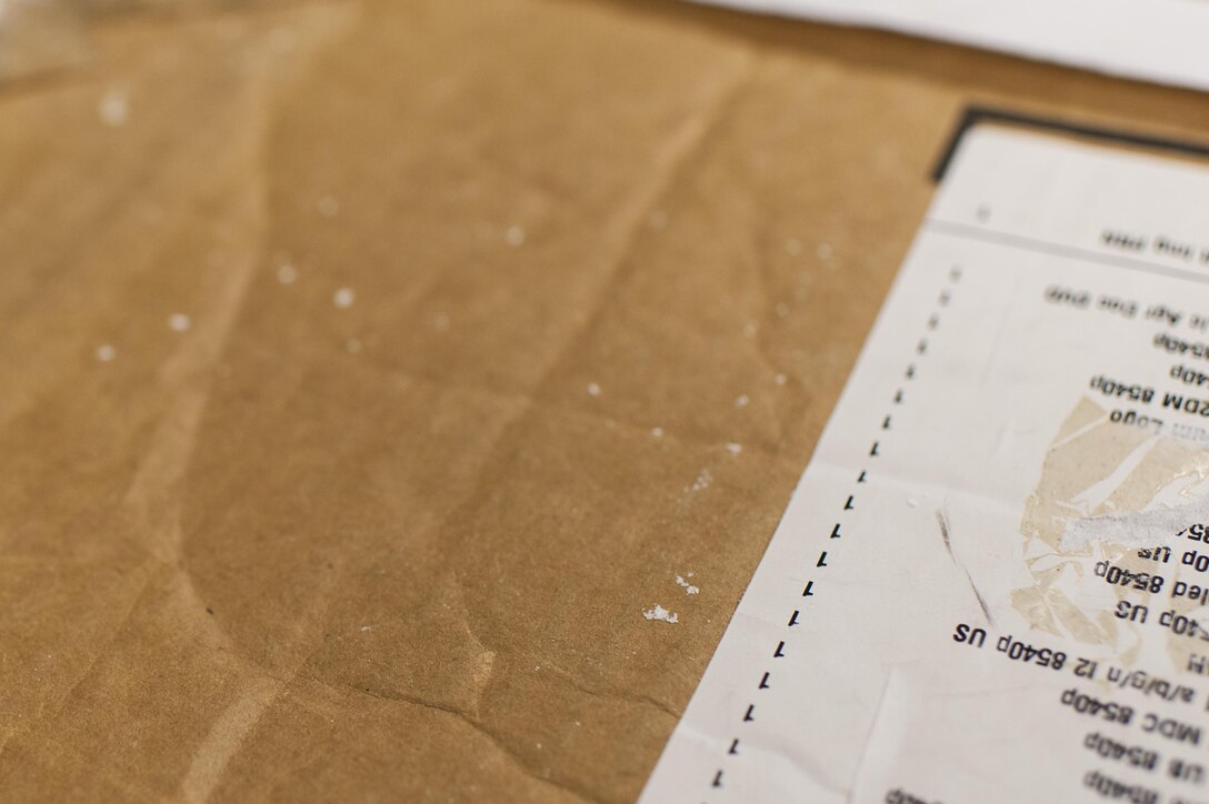 White powder residue is visible on a simulated suspicious package during a Mission Readiness Exercise, Sept. 21, 2016, at Fort Bragg, N.C. The 14th Human Resources Sustainment Center, also based at Fort Bragg, N.C., will be deploying to the U.S. Army Central Command theater. (U.S. Army photo by Timothy L. Hale)(Released)