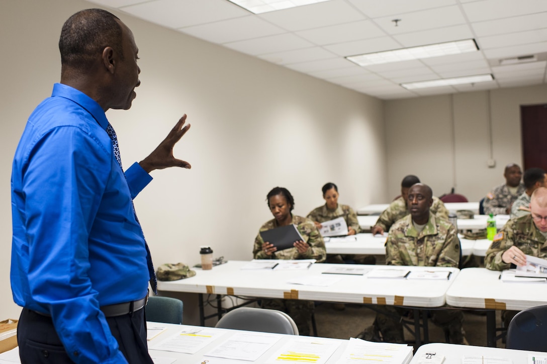 Anthony Perry, a Postal & Official Mail Management Analyst with the U.S. Army Reserve Command Services & Support Division, reviews mail-handling procedures during a Mission Readiness Exercise, Sept. 21, 2016 at Fort Bragg, N.C. The 14th Human Resources Sustainment Center, also at Fort Bragg, will be deploying to the U.S. Army Central Command theater. (U.S. Army photo by Timothy L. Hale)(Released)