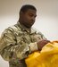 Pfc. Jamaal Monroe, a mail specialist with the 14th Human Resources Sustainment Center, Fort Bragg, N.C., opens a mail bag during a Mission Readiness Exercise, Sept. 21, 2016. Monroe, a mail specialist with the 14th Human Resources Sustainment Center, at Fort Bragg, will be deploying with the 14th HRSC to the U.S. Army Central Command theater. (U.S. Army photo by Timothy L. Hale)(Released)