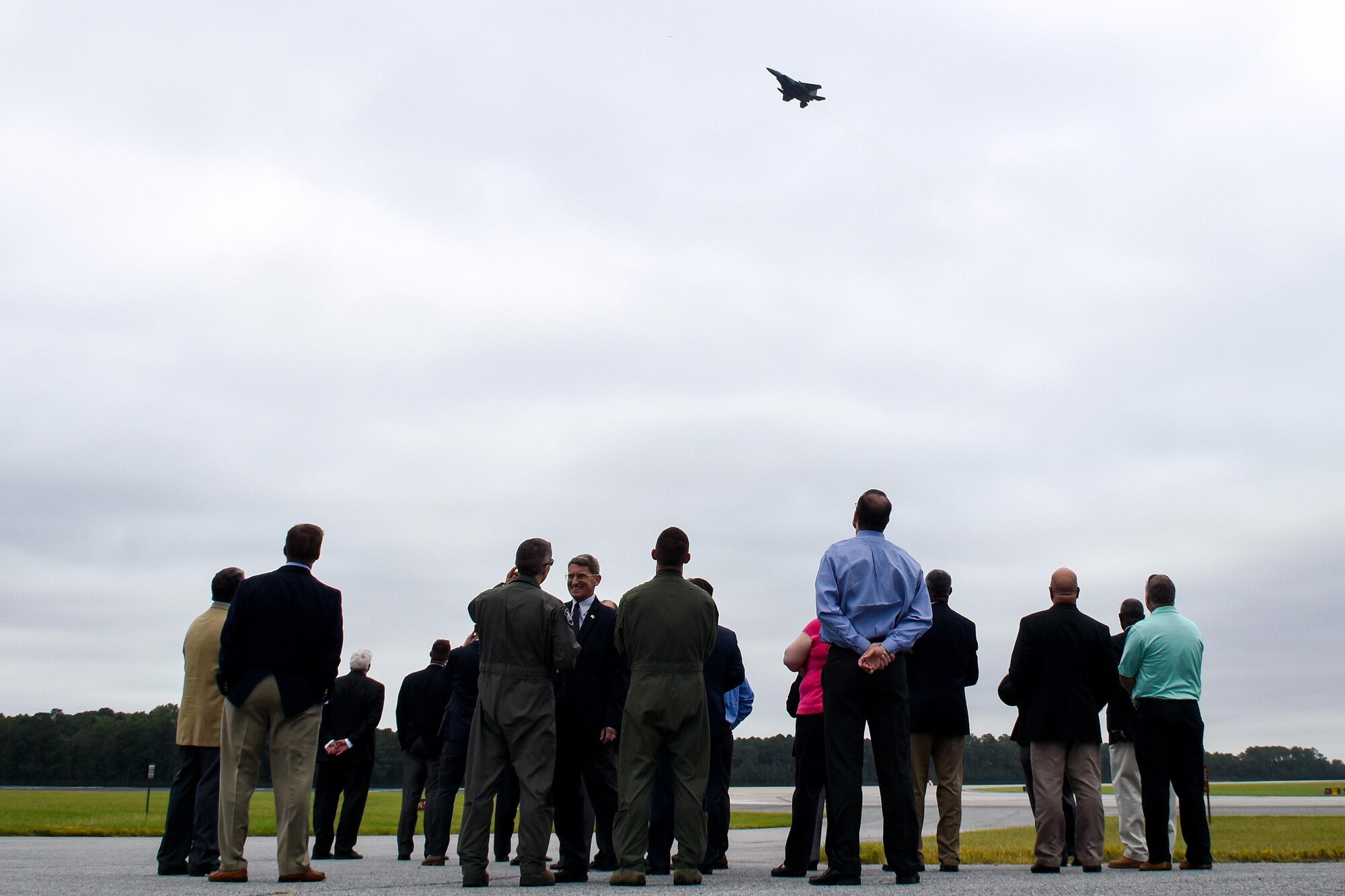 Distinguished visitors of the Joint Land Use Study Razor Talon tour watch an F-15E Strike Eagle from the 336th Fighter Squadron take off, Sept. 16, 2016, at Seymour Johnson Air Force Base, North Carolina. The aircraft participated in Razor Talon, which is a monthly exercise that allows service members unique opportunities to combine land, air and sea forces from all service branches in a realistic training environment. (U.S. Air Force photo by Airman Shawna L. Keyes)