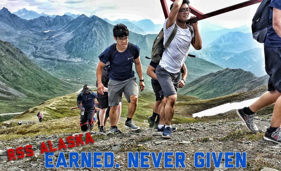 Poolees from RSS Alaska hike Hatcher Pass, a 3,886 foot high mountain in the Talkeetna Mountains, Alaska. The poolees carried pieces of a pull-up bar to assemble it at the peak of the mountain. (Photo courtesy of Marine Corps Recruiting Alaska Facebook page)