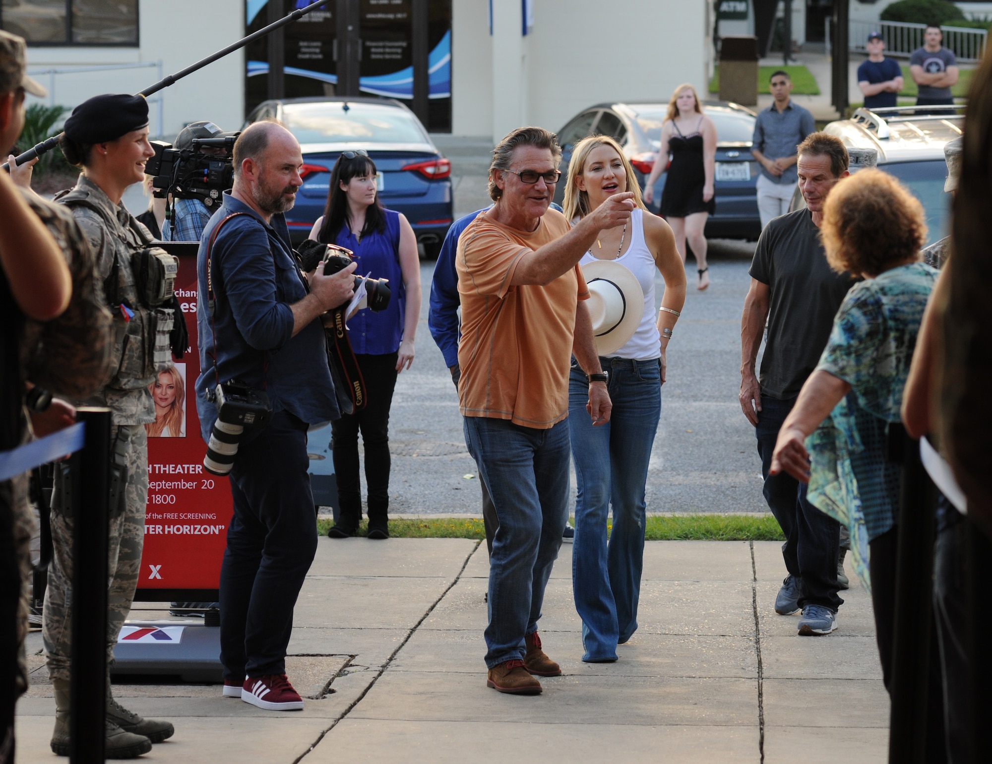 Kurt Russell and Kate Hudson, Deepwater Horizon actors, arrive at the Welch Theater before the Deepwater Horizon movie screening Sept. 20, 2016, on Keesler Air Force Base, Miss. Before the screening, Russell, Hudson and movie director, Peter Berg, took a short tour of the 81st Training Wing and 403rd Wing to meet with Airmen and learn about their missions at Keesler. (U.S. Air Force photo by Kemberly Groue/Released)