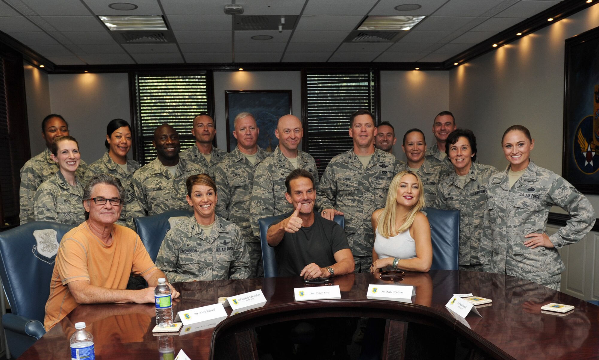 Peter Berg, Deepwater Horizon director, Kurt Russell and Kate Hudson, Deepwater Horizon actors, pose for a photo with 81st Training Wing leadership at the 81st TRW Headquarters Building before the Deepwater Horizon movie screening Sept. 20, 2016, on Keesler Air Force Base, Miss. Before the screening, Russell, Hudson and Berg took a short tour of the 81st TRW and 403rd Wing to meet with Airmen and learn about their missions at Keesler. (U.S. Air Force photo by Kemberly Groue/Released)