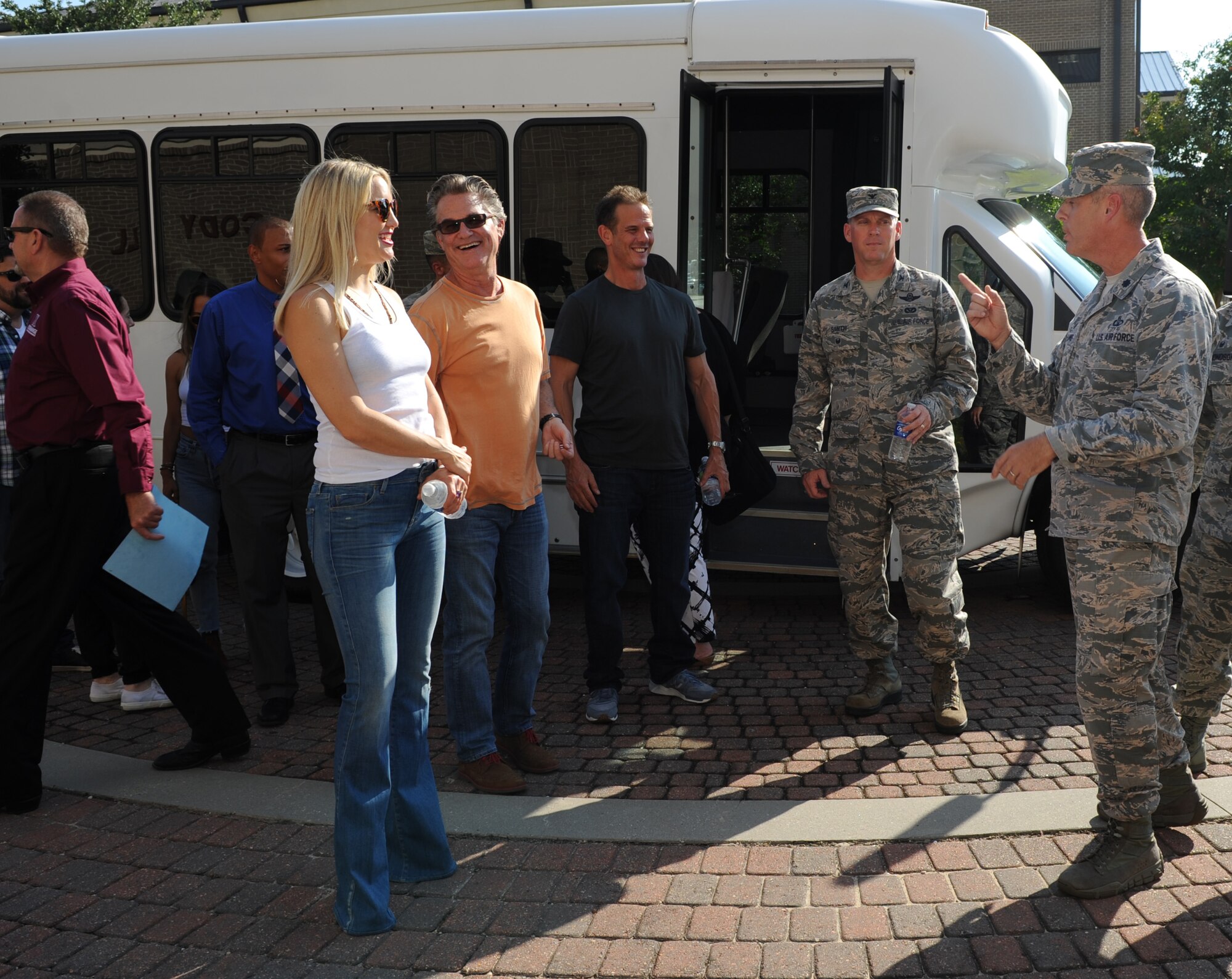 Kate Hudson, Kurt Russel, Deepwater Horizon actors, and Peter Berg, Deepwater Horizon director, receive a tour of  Cody Hall before the Deepwater Horizon movie screening Sept. 20, 2016, on Keesler Air Force Base, Miss. Before the screening, Russell, Hudson and Berg took a short tour of the 81st Training Wing and 403rd Wing to meet with Airmen and learn their missions at Keesler. (U.S. Air Force photo by Kemberly Groue/Released)