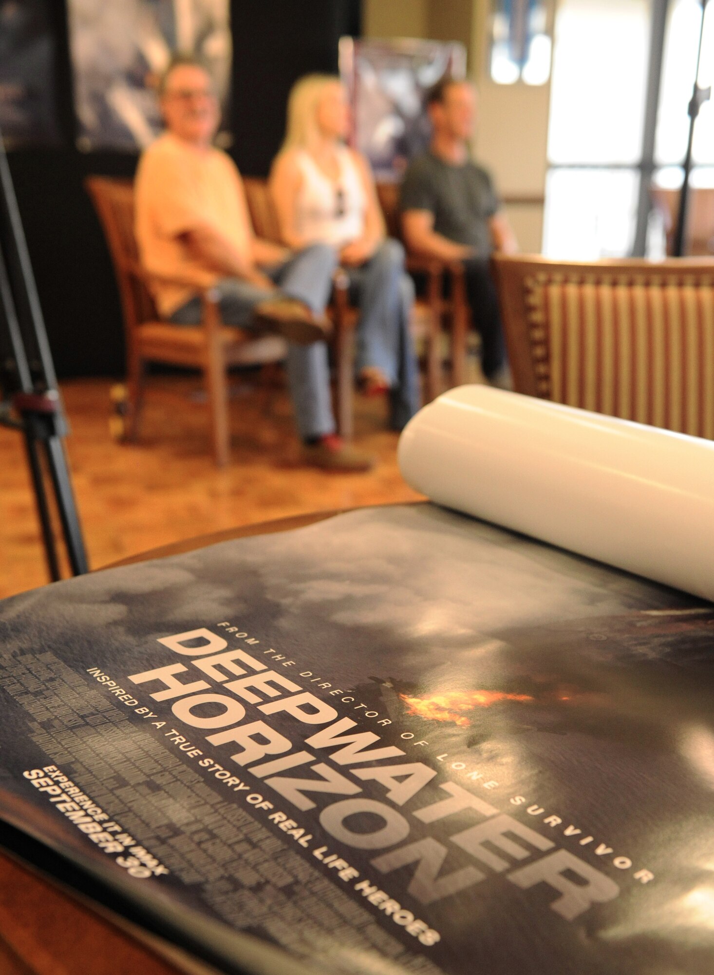 A Deepwater Horizon movie poster sits on a table at the Bay Breeze Event Center before the Deepwater Horizon movie screening Sept. 20, 2016, on Keesler Air Force Base, Miss. Before the screening, Kurt Russell, Kate Hudson, Deepwater Horizon actors, and movie director, Peter Berg, took a short tour of the 81st Training Wing and 403rd Wing to meet with Airmen and learn about their missions at Keesler. (U.S. Air Force photo by Kemberly Groue/Released)