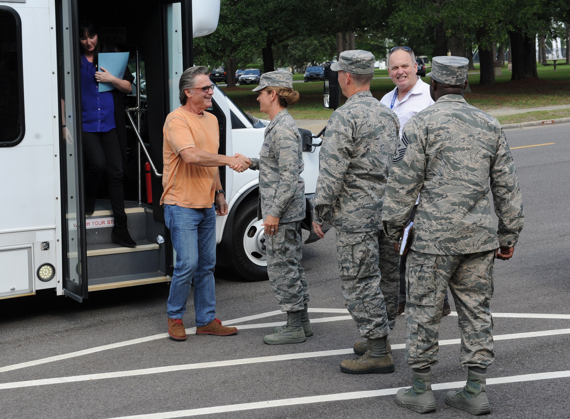 Kurt Russell, Deepwater Horizon actor, is greeted by Col. Michele Edmondson, 81st Training Wing commander, at the 81st TRW Headquarters Building before the Deepwater Horizon movie screening Sept. 20, 2016, on Keesler Air Force Base, Miss. Before the screening, Russell, actress, Kate Hudson, and movie director, Peter Berg, took a short tour of the 81st TRW and 403rd Wing to meet with Airmen and learn about their missions at Keesler. (U.S. Air Force photo by Kemberly Groue/Released)