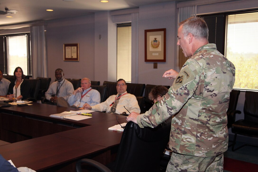 Col. John Hurley, commander, U.S. Army Engineering and Support Center, Huntsville, talks to members of Huntsville Center's Housing Planning Response Team Sept. 15, 2016, as they prepare to travel to Baton Rouge, Louisiana, to support the flood recovery effort.  