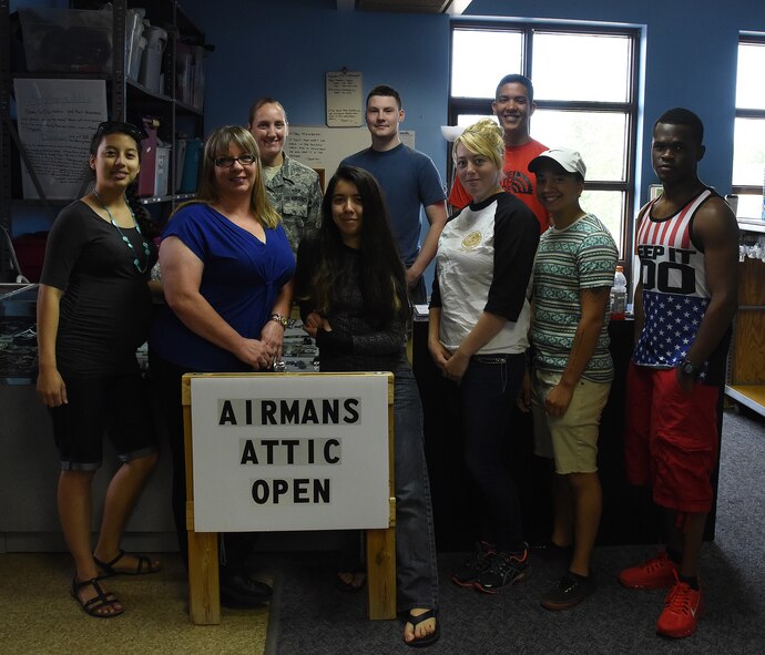 Volunteers from the Airman’s Attic pose for a photo Sept. 1, 2016, at Malmstrom Air Force Base, Mont. Volunteers are needed to keep, the Airman’s Attic operational and any active military card holders or dependents can volunteer. (U.S. Air Force photo/Senior Airman Jaeda Tookes)