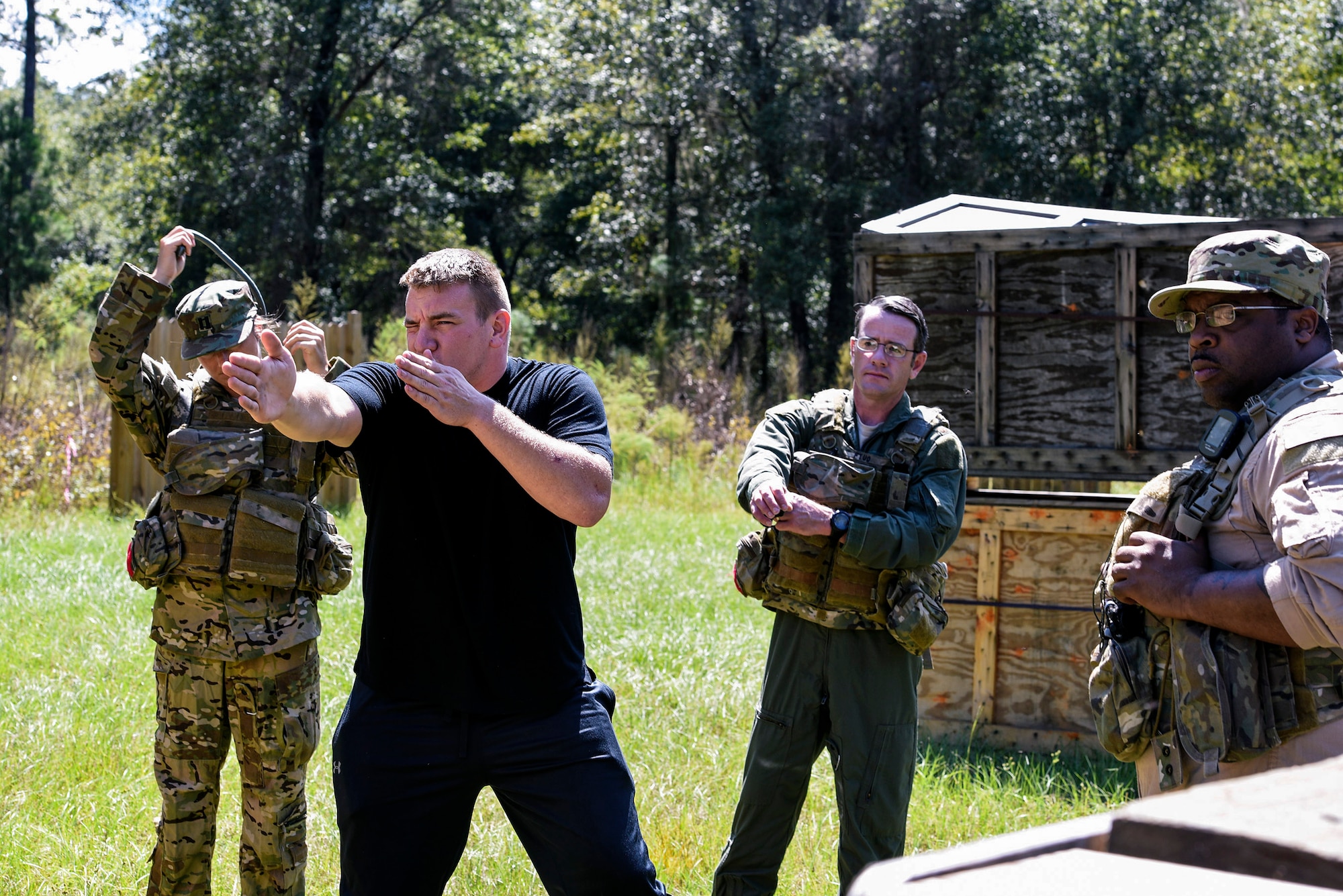 U.S. Air Force Tech. Sgt. Travis Siegwart, 347th Operations Support Squadron NCO in charge of survival, evasion, resistance and escape training, briefs aircrew Airmen during combat survival training, Sept. 20, 2016, at Moody Air Force Base, Ga. According to Siegwart, SERE operations require skill sets people don’t want to use, but are vital tools in life or death situations. (U.S. Air Force photo by Airman 1st Class Greg Nash)  