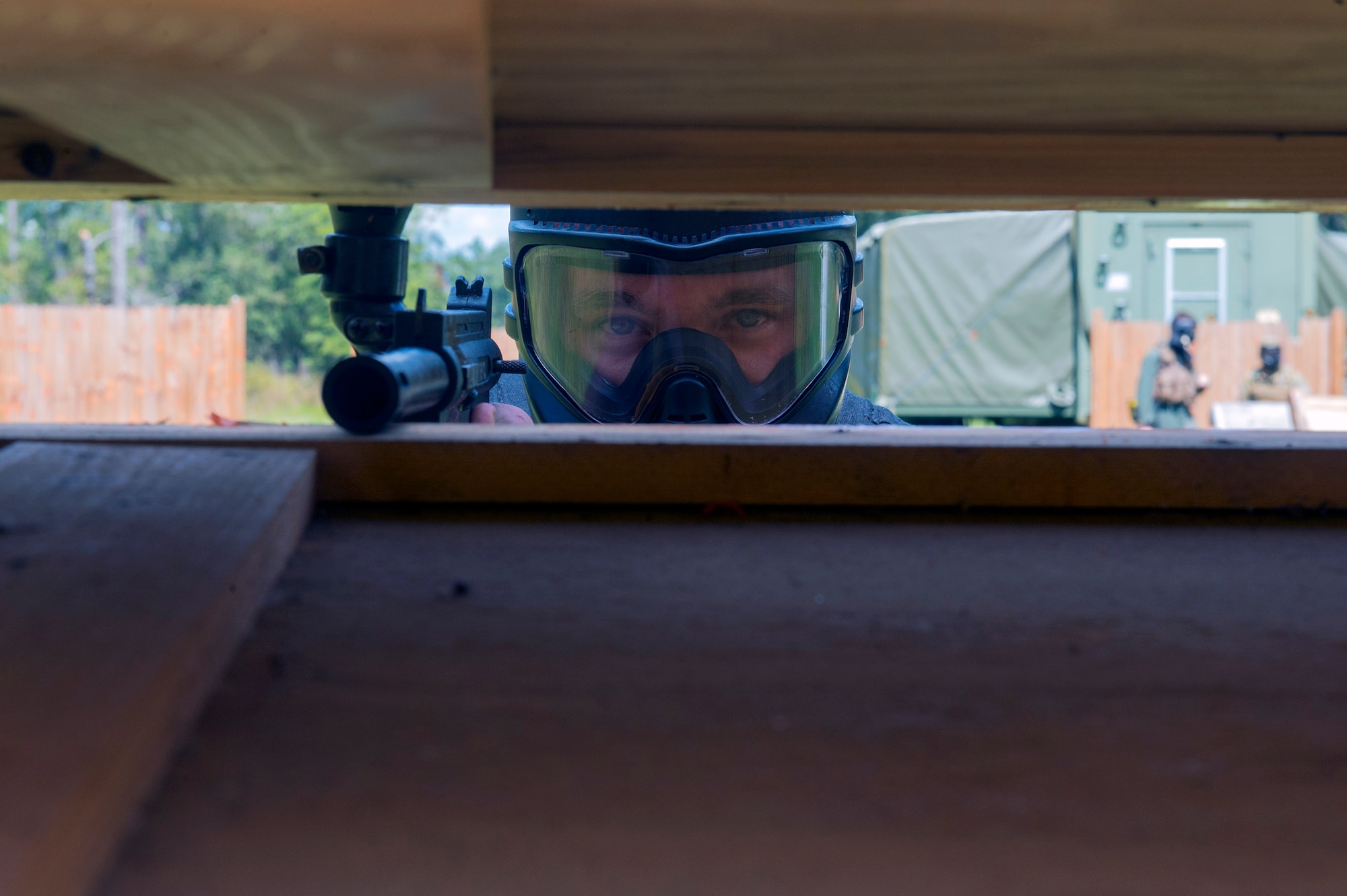 U.S. Air Force Tech. Sgt. Travis Siegwart, 347th Operations Support Squadron NCO in charge of survival, evasion, resistance and escape training, poses with a paintball gun before combat survival training, Sept. 20, 2016, at Moody Air Force Base, Ga. Siegwart’s motto is ‘Invenium Viam Aut Facium’, which is Latin for, ‘I will find a path, or make one.’ He says mindset helps him complete the physical and mental demands of being a SERE specialist. (U.S. Air Force photo by Airman 1st Class Greg Nash)  