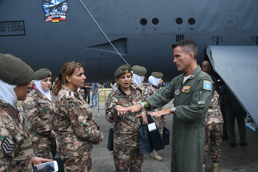 U.S. Air Force Maj. Kerry Baker, a B-52 Stratofortress navigator assigned to the 307th Bomb Wing, Barksdale Air Force Base, La., answers questions about the bomber during a tour for the Female Company for Special Security Tasks of the Jordanian Armed Forces at the NATO Days 2016, Ostrava, Czech Republic. The Jordanian company and the B-52 were participants in the air show that was attended by over 130, 000 people during the Sept. 17-18 event.  (U.S. Air Force photo by Master Sgt. Dachelle Melville/Released)