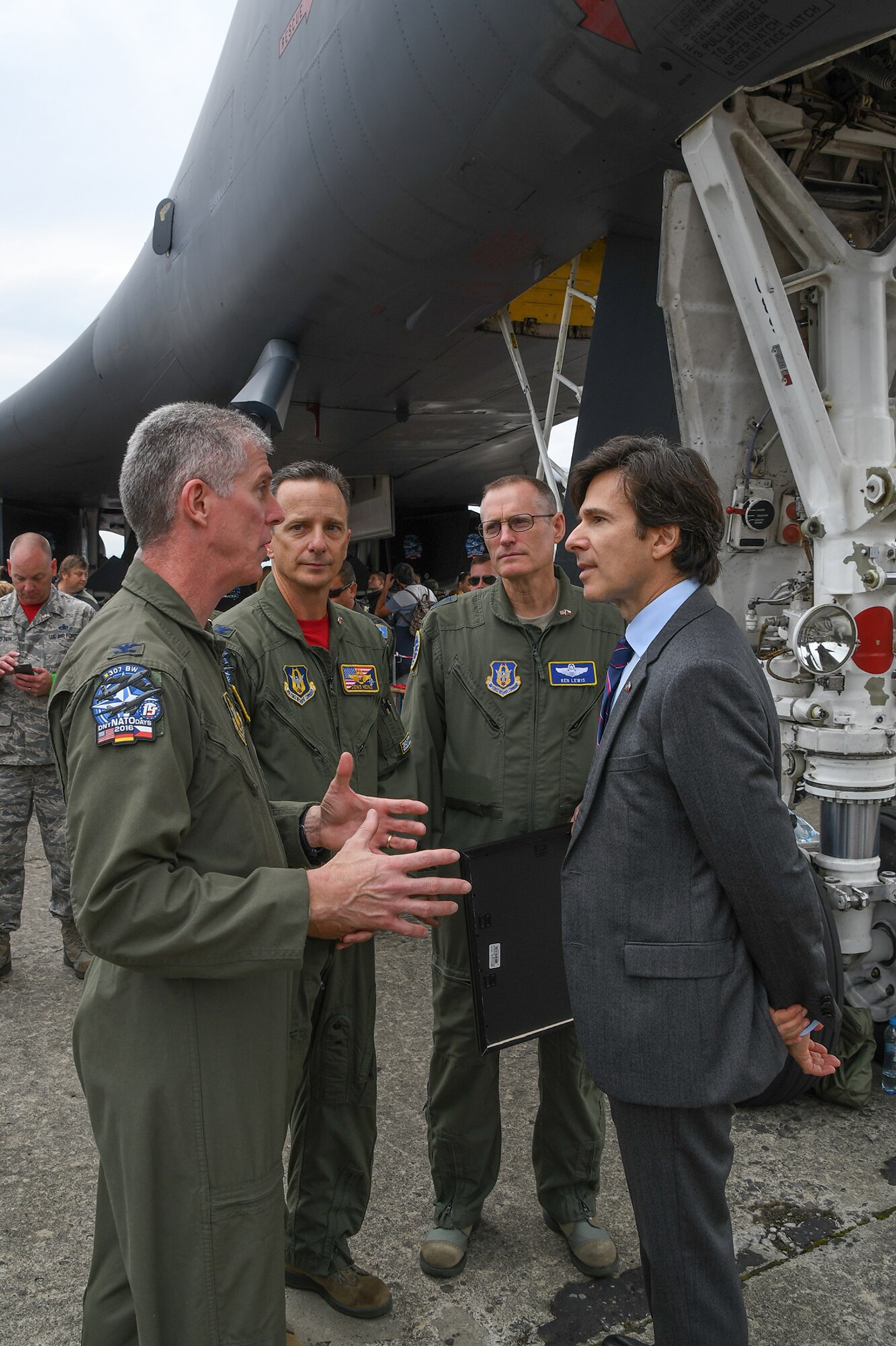 U.S. Air Force Col. James Morriss, 307th Bomb Wing vice commander, describes the roles of the B-52 Stratofortress and B-1 Lancer to the U.S. Ambassador to the Czech Republic, Andrew Schapiro at NATO Days 2016, Ostrava, Czech Republic. Schapiro was one of many distinguished visitors and over 130,000 people to visit the two static displays provided by the reserve wing Sept. 17-18. (U.S. Air Force photo by Master Sgt. Dachelle Melville/ Released)
