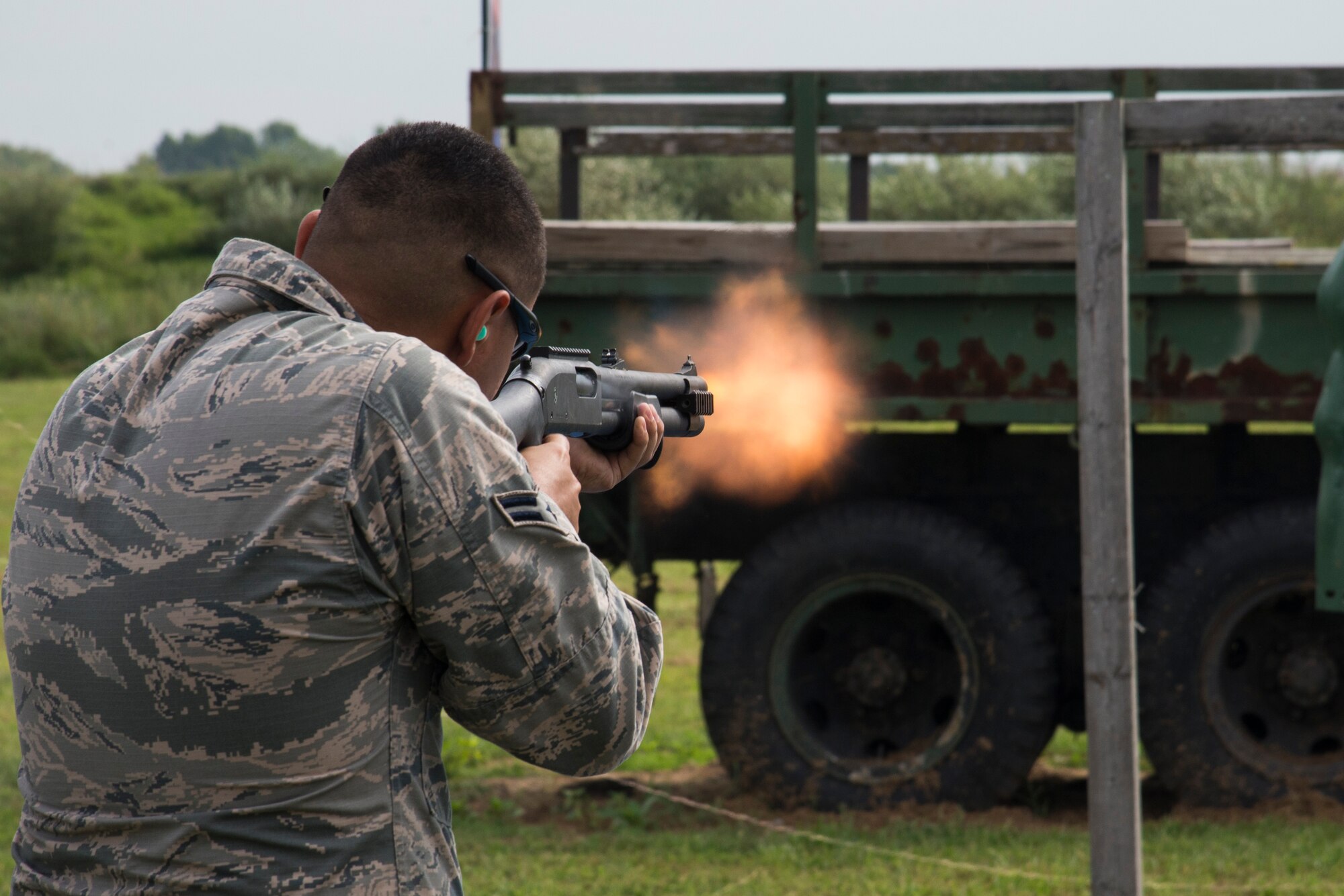 Airman 1st Class Chase Mirelez, 375th Security Forces Squadron member, participates in a non-lethal weapons training Sept. 8, 2016 at the Illinois National Guard Training Center in Sparta, Illinois. When law enforcement face aggressive, violent or hostile people personnel must be able to react with a proportional response. The use of lethal force is the last resort. Between the baton and firearms, less lethal systems are the intermediate solution. (U.S. Air Force photo by Airman 1st Class Gwendalyn Smith)