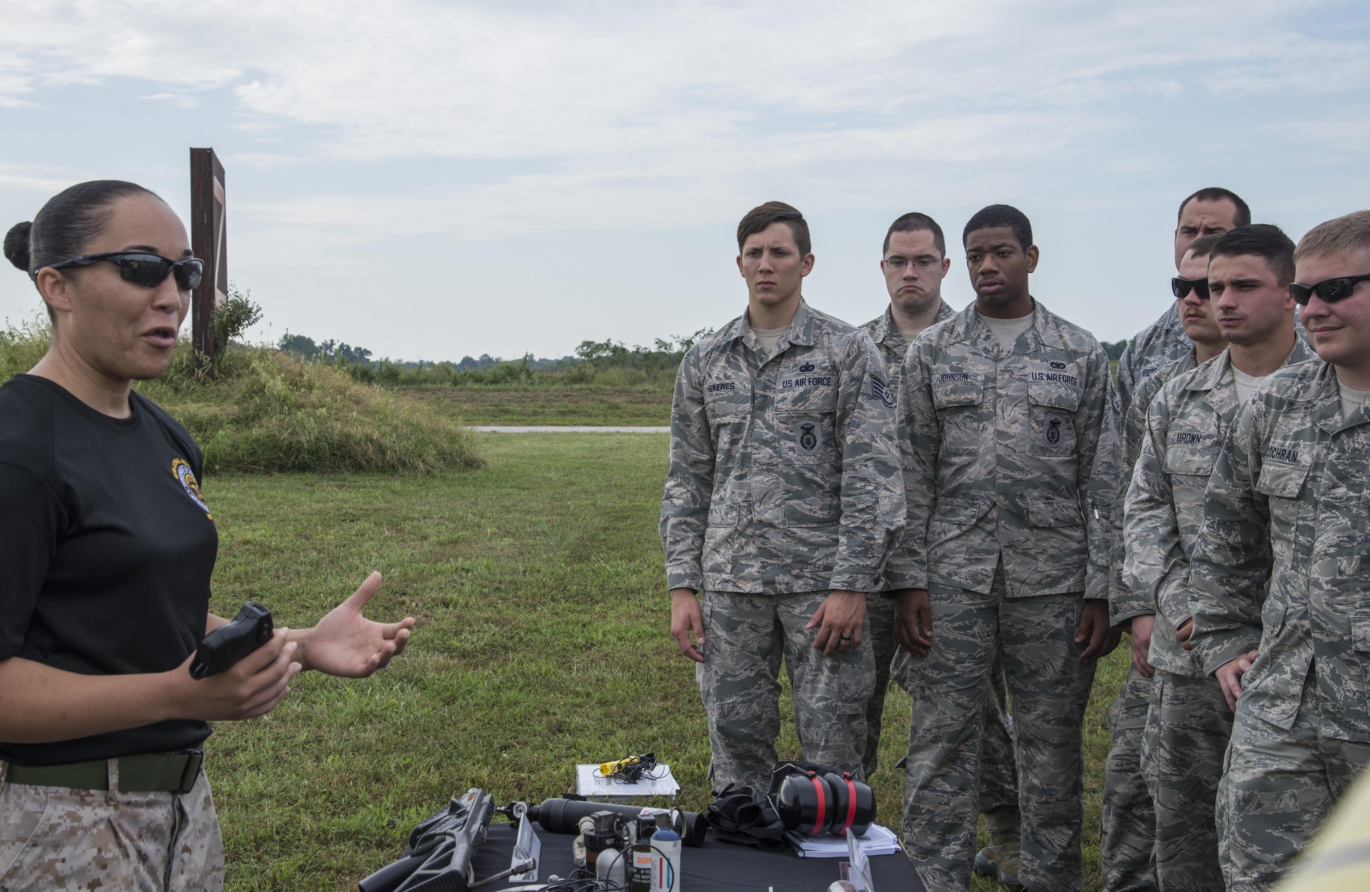 Cap. Anuarite Mubangu a Joint Non-Lethal Weapons Instructor gives a briefing during a non-lethal weapons training September 8, 2016 at the Illinois National Guard Training Center in Sparta Illinois. There were 27 attendees who took part in the training. In attendance were Members of the 375th Security Forces Squadron and Logistics Readiness Squadron, 126th SFS, and a representative from the District Attorney’s Office. (U.S. Air Force photo by Airman 1st Class Gwendalyn Smith)