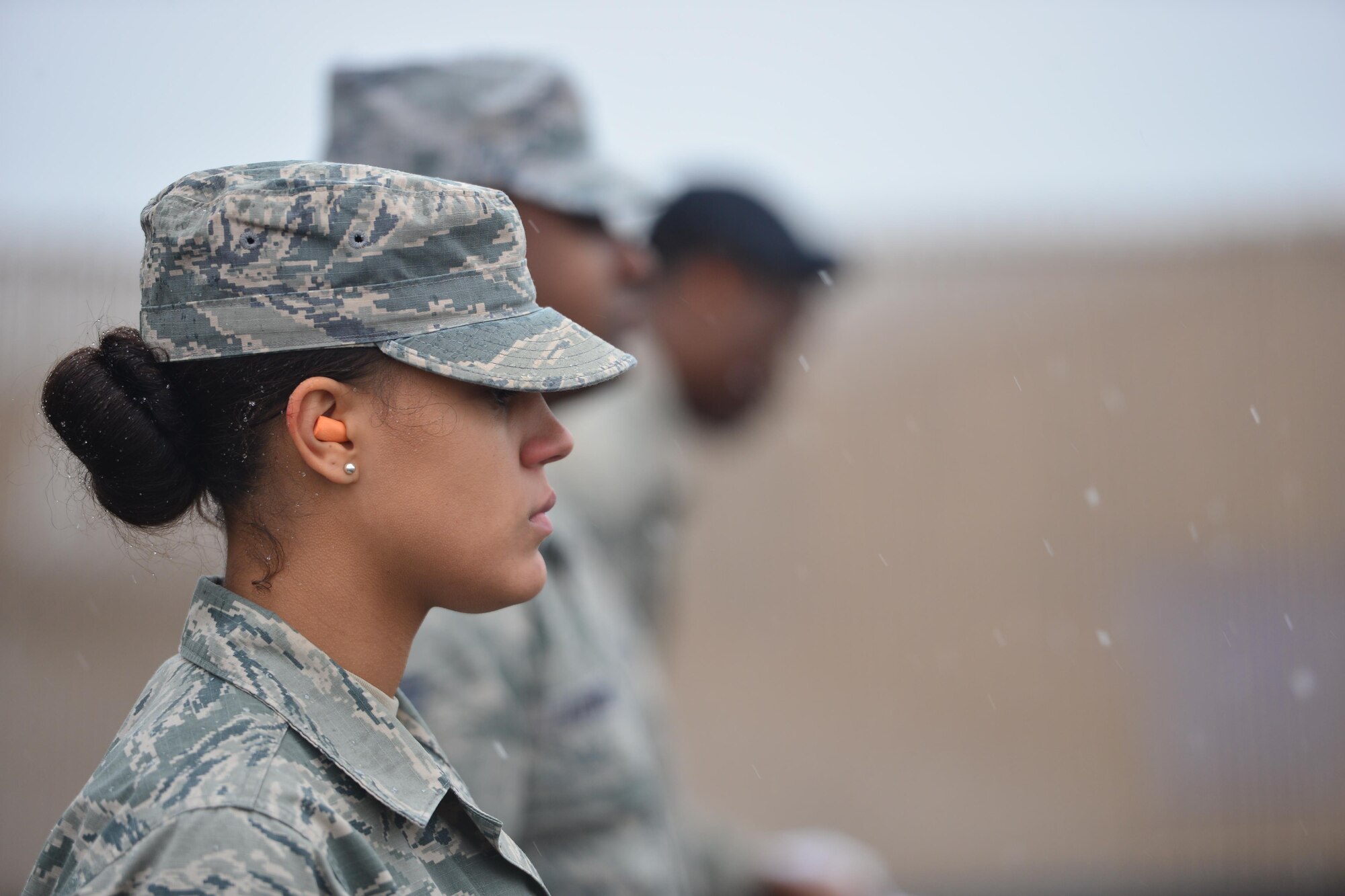 Airmen assigned to the 341st Missile Wing practice an honor guard firing party Dec. 10, 2015, at Malmstrom Air Force Base, Mont. Airmen of the 341st Missile Wing prepared for temperatures to drop. (U.S. Air Force photo/Airman Daniel Brosam)