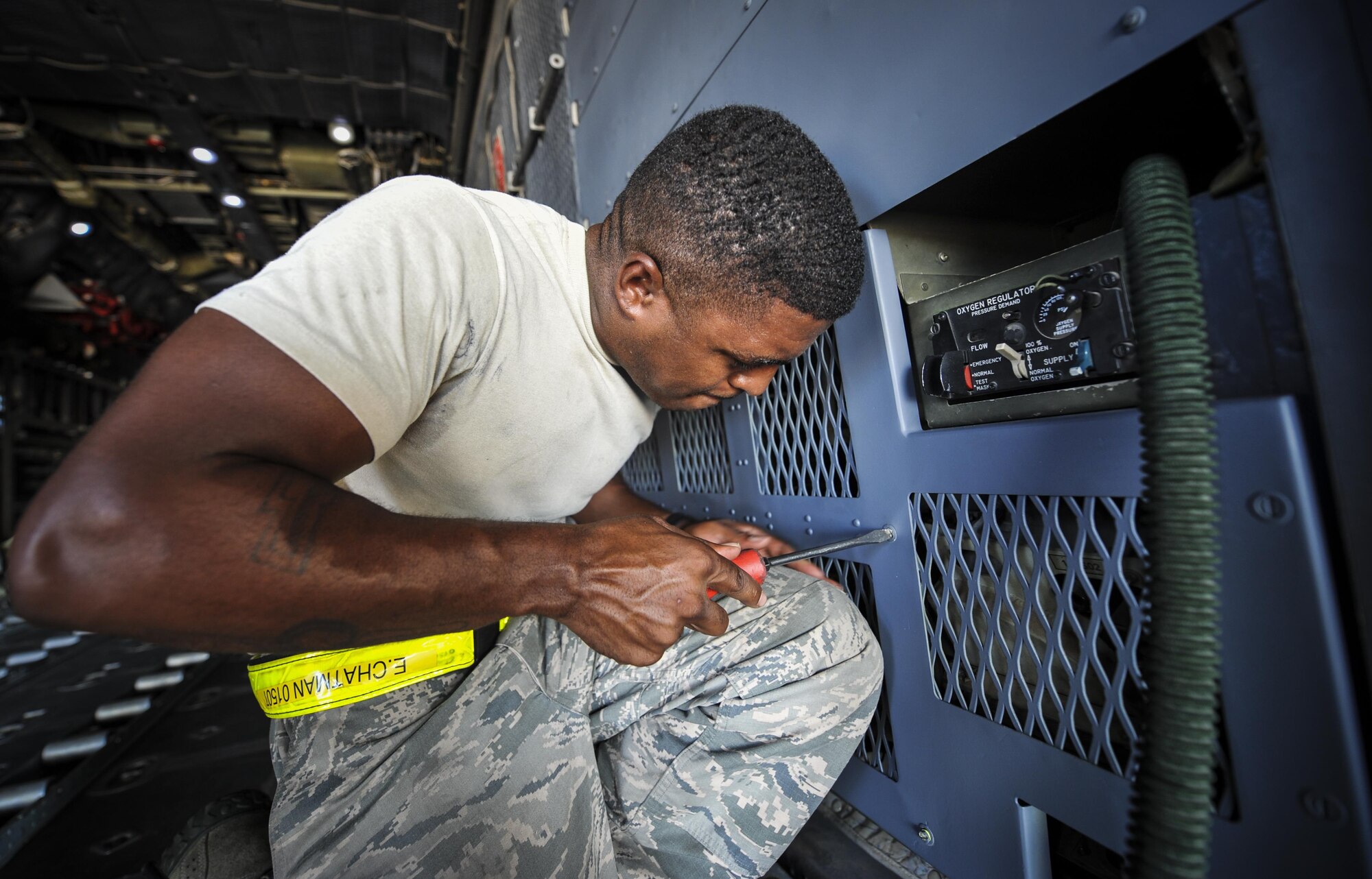 Staff Sgt. Eddie Chatman, a crew chief with the 15th Aircraft Maintenance Unit, secures a panel onboard an MC-130H Combat Talon II at Hurlburt Field, Fla., Sept. 21, 2016. The Combat Talon II provides infiltration, exfiltration and resupply of special operations forces and equipment in hostile or denied territory. (U.S. Air Force photo by Airman 1st Class Joseph Pick)