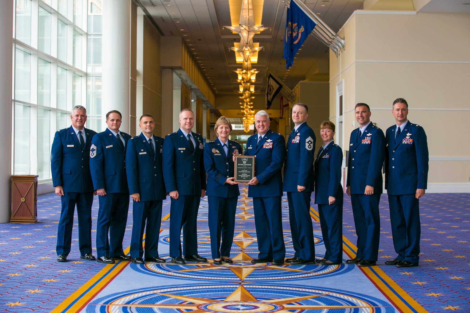 926th Wing members pose with Lt. Gen. Maryanne Miller, Chief of Air Force Reserve, upon receipt of their Air Force Association Award on Sept. 19.