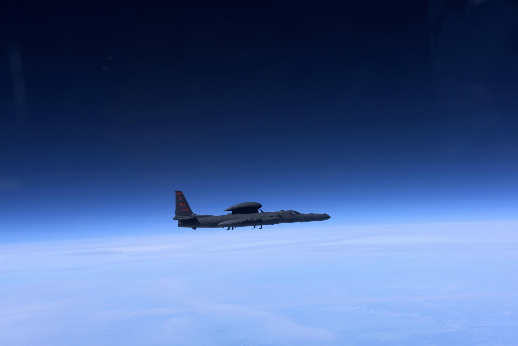 A U- 2 Dragon Lady approaches an altitude near 70,000 ft. above California, Mar. 23, 2016. The pilot must wear a full-pressure suit similar to NASA astronaut suits. (U.S. Air Force photo/Staff Sgt. Robert M. Trujillo)