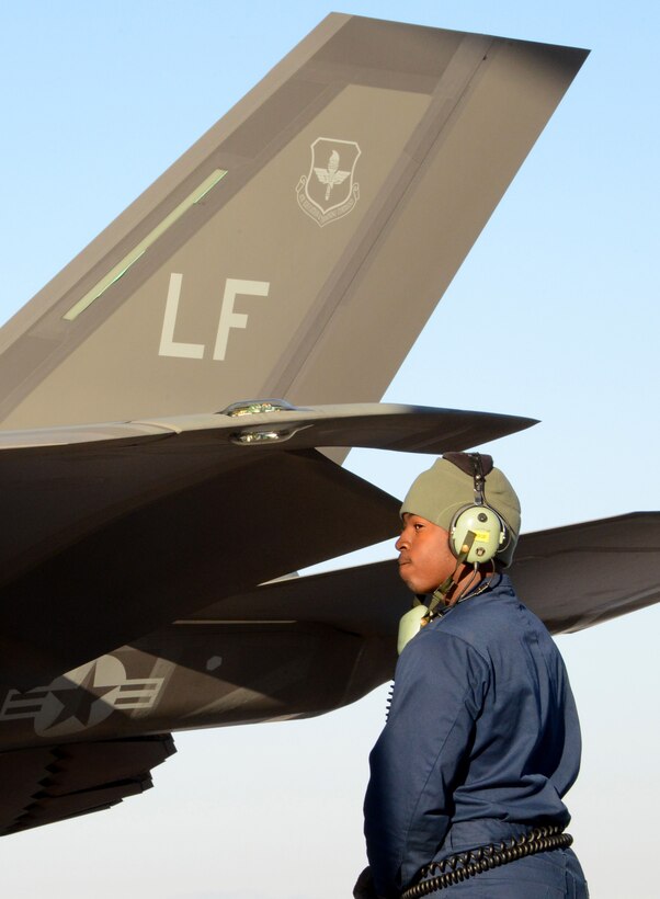 Senior Airman Teddy Colbert, 61st Aircraft Maintenance Unit F-35 crew chief, waits for the pilot to perform engine checks September 16, 2016, prior to launching an F-35 Lightning II at Mountain Home Air Force Base, Idaho. Luke sent jets to Mountain Home AFB because it provides a unique opportunity for developing proficiency in the destruction of surface-to-air threats at their range complex. (U.S. Air Force photo by Tech. Sgt. Timothy Boyer)