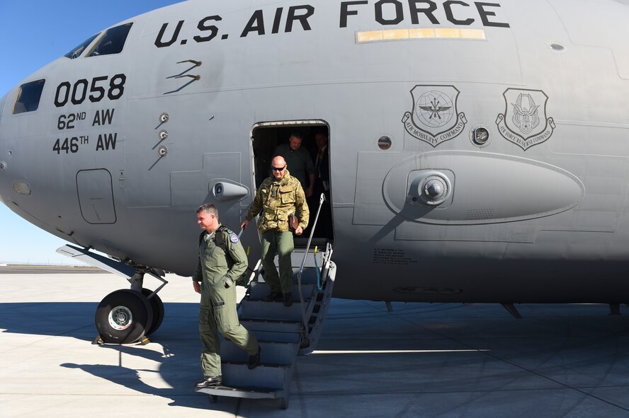 International air crew members depart a McChord C-17 Globemaster III Sept. 21, 2016 at Grant County International Airport a.k.a. Moses Lake Sept. 21, 2016. Eight nations visited the base as part of Air Mobility Command’s Mobility Guardian week-long in progress review at Joint Base Lewis-McChord, Washington, in order to attend the planning conference. (Air Force photo/ Staff Sgt. Naomi Shipley)