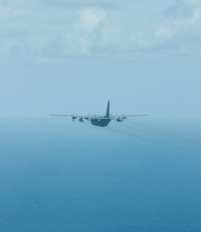 A U.S. Air Force C-130 Hercules from the Georgia Air National Guard's 165th Airlift Wing flies towards the horizon on a sortie during Sentry Aloha at Joint Base Pearl Harbor-Hickam, Hawaii on Aug. 29 2016. Sentry Aloha is an ongoing series of combat exercises hosted by the Hawaii Air National Guard and involves a variety of fighter and support aircraft from varying Air Force, Air National Guard, and DoD participants. (U.S. Air National Guard photo by Airman 1st Class Stan Pak/released)