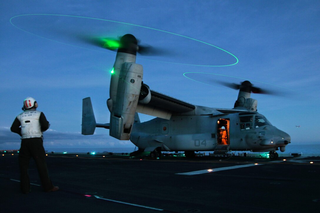 An MV-22B Osprey tiltrotor aircraft idles on the flight deck of the USS Bonhomme Richard during Valiant Shield 16 off the coast of the Northern Mariana Islands in the Philippine Sea, Sept. 20, 2016. Marine Corps photo by Cpl. Samantha Villarreal