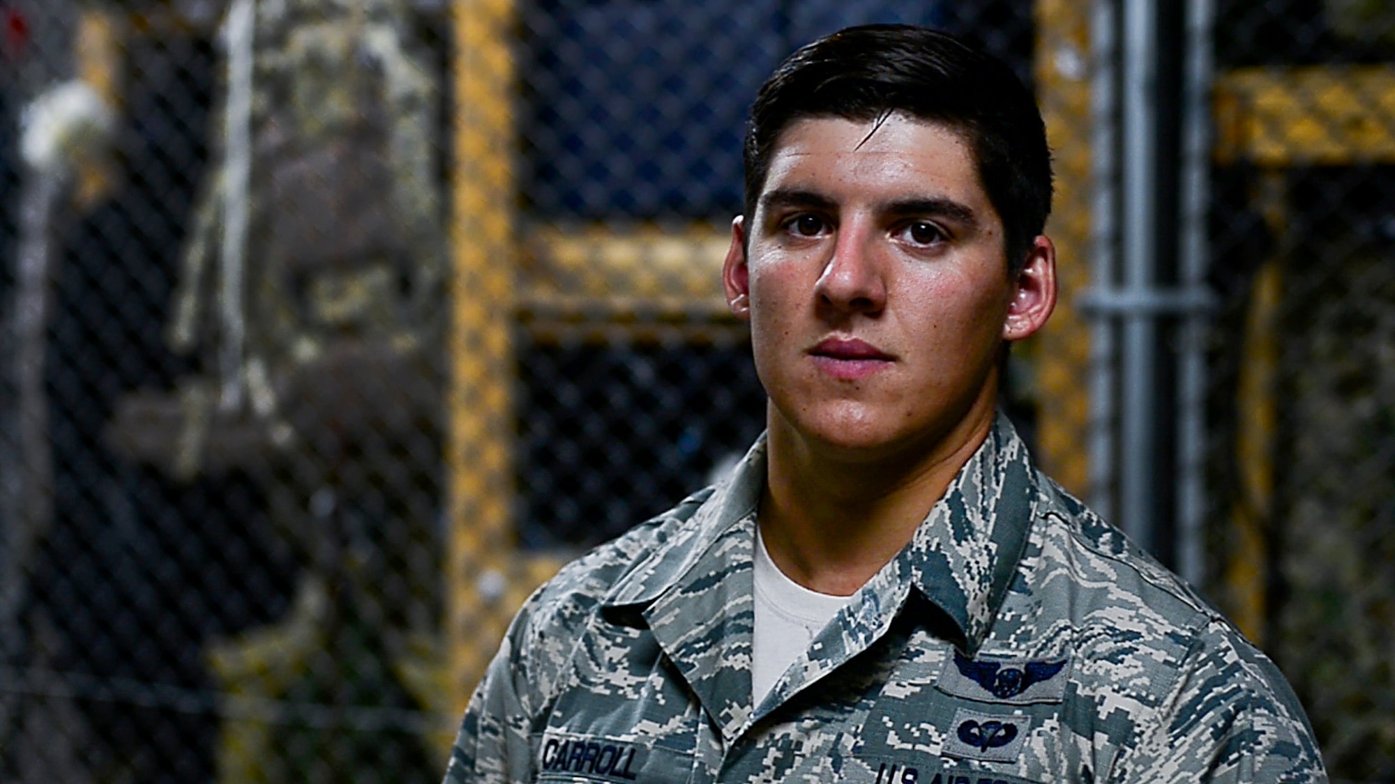 U.S. Air Force Staff Sgt. Austen Carroll, 31st Rescue Squadron pararescueman. poses for a photo Sept. 22, 2016, at Kadena Air Base, Japan. Carroll freefell about 10-feet from the helicopter into the ocean to save a downed pilot. (U.S. Air Force photo by Senior Airman Scott Fremming)