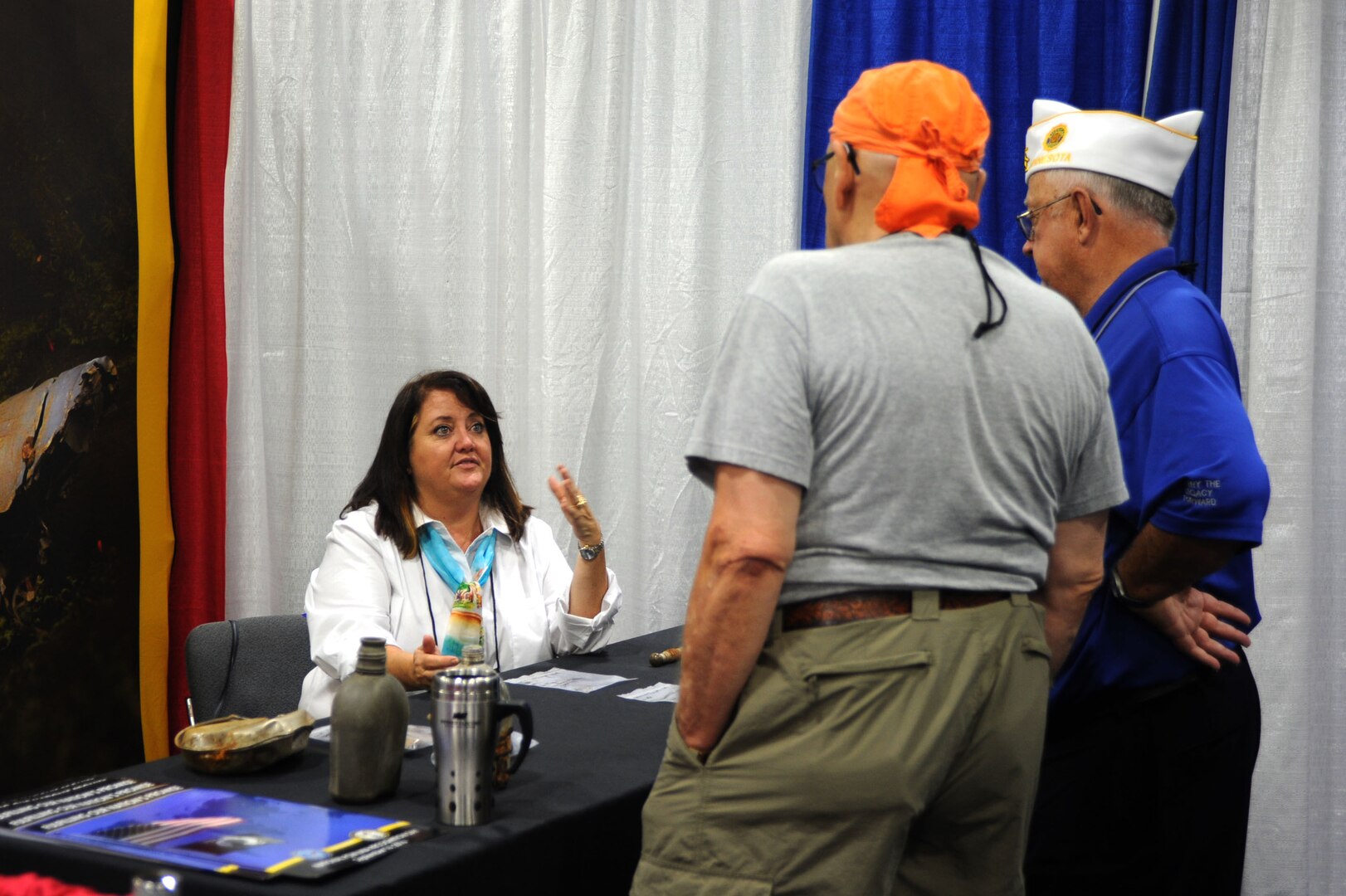 Linda Read, the Defense POW/MIA Accounting Agency (DPAA) chief of community relations and protocol, speaks to legionnaires at the American Legion’s 98th National Convention in Cincinnati, Aug. 26, 2016. DPAA attended the convention to answer questions and ensure members that DPAA’s mission continues; to provide the fullest possible accounting for our missing personnel to their families and the nation. (DoD photo by Staff Sgt. Jocelyn Ford/USAF)