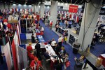 Members of the American Legion explore the exhibit hall Aug. 30, 2016, during the American Legion’s 98th National Convention in Cincinnati. The convention brought together more than 8,000 members discus positions, policies, and resolutions for the upcoming year. (DoD photo by Staff Sgt. Jocelyn Ford/USAF)