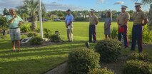 Robert Tertzakian, left, retiree, thanks Gunnery Sgt. Raymond Andresen, a Marine with Marine Aviation Logistic Squadron 29, for saving his life on the Magnolia Greens Golf Course at Leland, North Carolina, Sept. 20. Andresen was awarded the Navy Achievement Medal for his immediate actions in handling Tertzakian’s heart attack in May. (Photo by Lance Cpl. Tavairus Hernandez/Released)