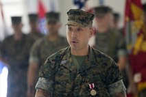 MARINE CORPS AIR STATION NEW RIVER, N.C. — Sgt. Maj. Luis Leiva, outgoing sergeant major of Headquarters and Headquarters Squadron, speaks about his time with the squadron at a Post and Relief Ceremony at Marine Corps Air Station New River, Sep. 16. Leiva thanked the Marines for their hard work and spoke about servant leadership. (U.S. Marine Corps photo by Cpl. Ned Johnson/Released)