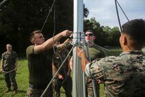 Marines take down a Meteorological Radar Subsystem at Marine Corps Air Station New River, N.C., Sept. 14, 2016. The MRS, being used by Marines with Meteorology and Oceanography platoon, 2nd Intelligence Battalion and Marine Air Traffic Control Detachment Bravo, Marine Air Traffic Control Squadron 2, is used to predict cloud cover, tropical storms and other possible weather systems in the area. (U.S. Marine Corps photo by Lance Cpl. Ashley Lawson/Released)