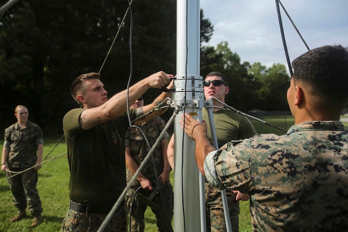 Marines take down a Meteorological Radar Subsystem at Marine Corps Air Station New River, N.C., Sept. 14, 2016. The MRS, being used by Marines with Meteorology and Oceanography platoon, 2nd Intelligence Battalion and Marine Air Traffic Control Detachment Bravo, Marine Air Traffic Control Squadron 2, is used to predict cloud cover, tropical storms and other possible weather systems in the area. (U.S. Marine Corps photo by Lance Cpl. Ashley Lawson/Released)