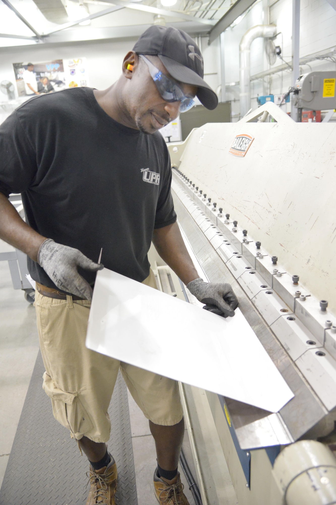 Keith Felder, 402nd Maintenance Support Group sheet metal specialist, performs sheet metal fabrication. The 402nd MXSG is comprised of 400-plus employees at 12 work sites, to include infrastructure engineering, chemical laboratories and the Precision Measurement Equipment Laboratory. (U.S. Air Force photo by Ray Crayton)
