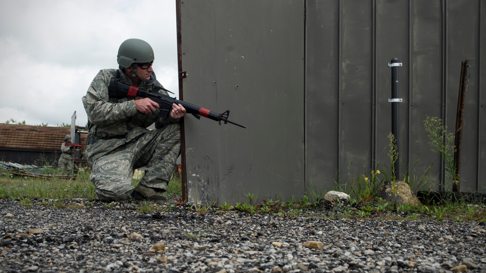 Staff Sgt. George Walker, 434th Civil Engineer Squadron electrical power production supervisor, conducts a security sweep during an exercise Sept. 10, 2016 at Grissom Air Reserve Base, Ind. The exercise was meant to demonstrate a whole squadron response to base recovery, sustainment and protection through a combination of civil engineering and emergency response capabilities. (U.S. Air Force photo/Staff Sgt. Katrina Heikkinen)